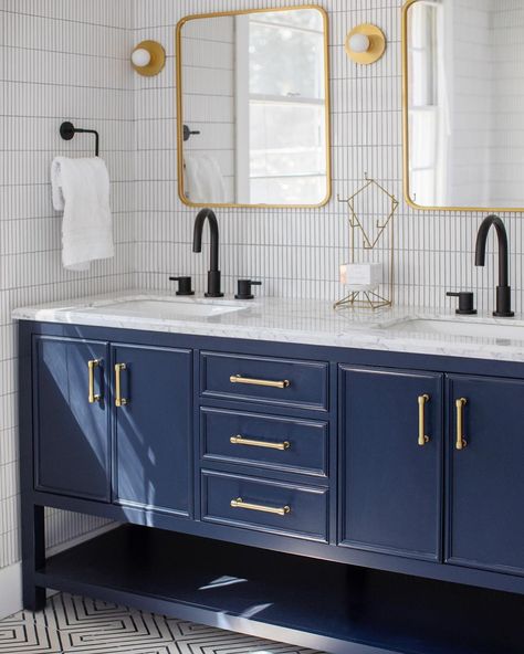 Ferguson matte black signature hardware and hudson valley sconces pair to create a sleek, modern bathroom Gold Blue Bathroom, Ferguson Bathroom, Paint Fireplace Tile, Blue Bathroom Ideas, Hallway Light Fixtures, Blue Vanity, Tiles Floor, Charleston Homes, Under Sink Organization