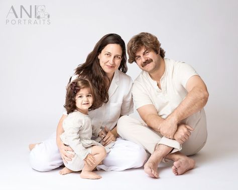 family of three wearing neutral outfits sitting on the floor Indoor Family Portraits, Studio Family Photos, Neutral Family Photos, Maternity Photography Los Angeles, Parents Photography, Photography Ideas Family, Family Photography Studio, Three Family, Outfits Neutral