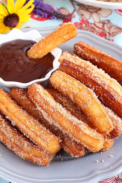 Try this churros recipe for yummy, crunchy dough-fried treat with chocolate dip sauce. So good and filling and so easy to make. | www.foxyfolksy.com Homemade Churros, Chocolate Dip, Churros Recipe, Dip Sauce, Dessert Shop, Köstliche Desserts, Chocolate Sauce, Donut Recipes, Vegetarian Chocolate