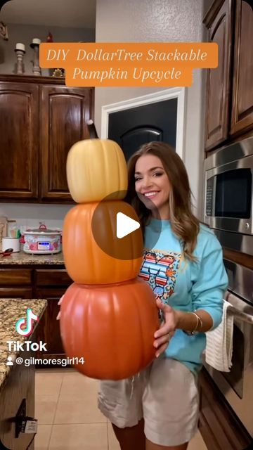 Amanda Jean Gilmore | I love these stackable pumpkins from the DollarTree. I used bakingsoda, paint and some fall greenery for a cheap and simple upcycle. I... | Instagram Diy Pumpkin Porch Decor, Halloween Stackable Pumpkins, Christmas Decor With Pumpkins, Stacking Pumpkins Porch Diy, Fall Decorations Porch Farmhouse, Painted Stacking Pumpkins, 3 Tier Pumpkin Decoration, Easy Diy Outdoor Fall Decor, Stacked Pumpkin Planter