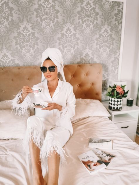 Silk Pyjamas accessorised with ostrich feathers Glam Getting Ready Aesthetic, Feather Pjs Bride, Feather Pajama Set, Bachelorette Pajama Party, Feather Pyjamas, Bridal Pyjamas, Feather Pajamas, Pajama Party Outfit, White Pyjamas