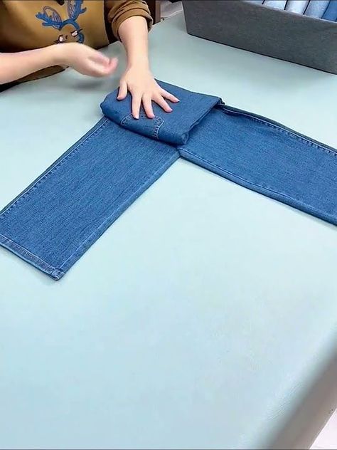 How To Fold Jeans, Folding Jeans, Unique Jeans, Shirt Folding, Jean Crafts, Folding Clothes, Clothing Hacks, Clothes Organization, Folded Up