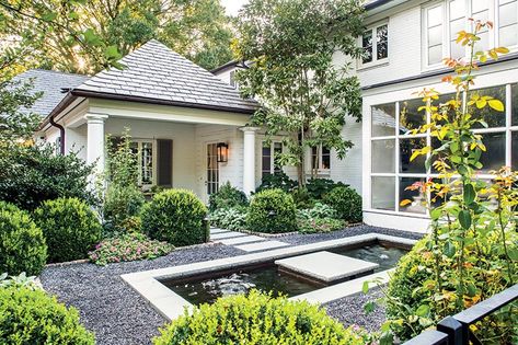 Before + After: A Serene Charlotte Renovation - Southern Home Magazine French Style Home Exterior, Before After Renovation, Ruard Veltman, Southern Home Magazine, Remodel Garage, French Style Home, Brick Archway, Exterior Garden, Front Facade