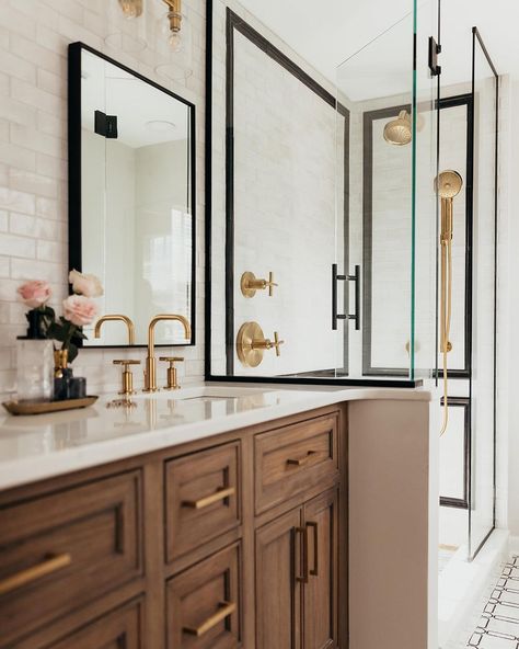 Elegance meets charm in this master bathroom featuring our Calacatta Mirragio quartz countertop ✨ ⁠ ⁠ Paired with a delicate mix of black, white and gold fixtures, every detail is crafted to perfection, from the luxurious countertops to the chic accents.⁠ ⁠ Visit armina.com to explore our extensive stone selections!⁠ ⁠ #arminastone #bathroomtiles #calacatta #bathroommakeover #bathroomcounters #bathroomcountertop #miamimarble #homeremodelers #vanitygoals #floridarenovation #miamiremodel #bathr... White And Black Bathroom With Gold Accents, Gold And Black Accents Bathroom, Bathroom With Black And Gold Accents, Bathroom With Black And Gold Fixtures, Calacatta Mirragio Quartz, Black Quartz Bathroom Countertops, Mixing Black And Gold Hardware Bathroom, Mix Metals In Bathroom, Black And Gold Bathroom Fixtures