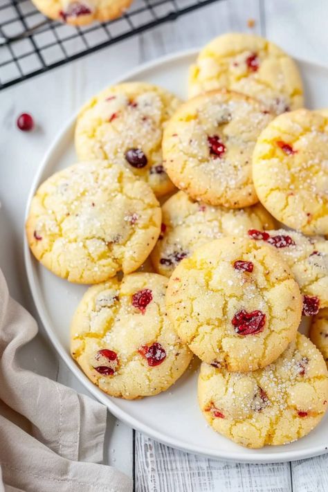 These zesty orange cranberry cookies are such a treat! They're soft, chewy, and bursting with so much delicious flavor. Soft Cranberry Orange Cookies, Cranberry Orange Cookies With Dried Cranberries, Orange Craisin Cookies, Orange Amaretti Cookies, Orange Cranberry Spice Cookies, Orange Cranberry Cookies Soft, Keiflies Cookies, Cranberry And Orange Cookies, Candied Orange Peel Cookies