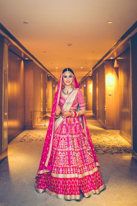 Pretty hot pink lehenga with embroidery for wedding. See more on wedmegood.com  #wedmegood #indianwedding #indianbride #pink #lehenga #lehengacholi #bridaljewelry #bridallehengacholi #bridallehenga #hotpink #bridalmakeup #bridalwear Indian Wedding Dress Bridal Lehenga, Gota Patti Lehenga, Pink Bridal Lehenga, Designer Bridal Lehenga Choli, Wedding Lehenga Designs, Indian Bride Outfits, Bridal Lehenga Collection, Designer Bridal Lehenga, Indian Bridal Lehenga