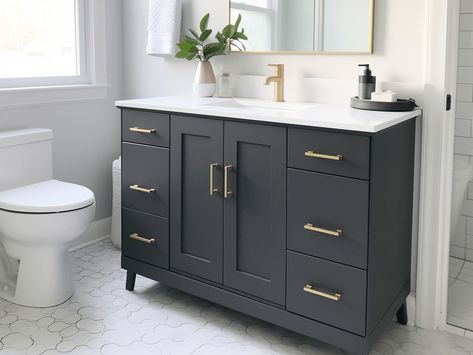 dark gray, with navy undertone painted cabinet in the bathroom - paint bathroom vanity cabinets Dark Charcoal Vanity Bathroom, Bathroom Vanity With Grey Tile, Bathroom Vanity Iron Ore, Dark Grey Vanity, Dark Gray Bathroom Cabinets, Dark Painted Bathroom Cabinets, Dark Gray Vanity Bathroom Ideas, Dark Gray Vanity, Dark Grey Vanity Bathroom