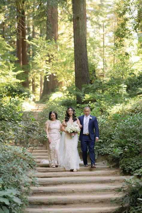 Bride walking down the aisle during her wedding ceremony at Nestldown. A stunning forest wedding at Nestldown in the Bay Area was the perfect wedding venue for this couple! Find more wedding venues california redwoods, forest wedding pictures, forest wedding flowers, bay area outdoor wedding venues, & forest wedding venue ideas. Book Bry for a romantic Bay Area wedding by heading to brysphotography.com! Forest Wedding Pictures, Forest Wedding Flowers, Wedding Venues Forest, Wedding Venues California, Nestldown Wedding, Bride Walking Down The Aisle, Forest Wedding Venue, California Redwoods, Backyard Wedding Ceremony