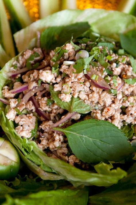 NYT Cooking: Larb gai is a dish of chopped chicken, mint, basil and red onions dressed with lime juice and ground red chilies. (The dish is sometimes spelled laab, lob or lop.) Nytimes Cooking, Thai Larb, Larb Gai, Chicken Larb, Hot Weather Meals, Fresh Herb Recipes, Minced Pork, Laos Food, Semillon