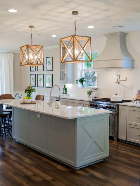 Like: sage green cabinets, X-design on island, drawers on ALL lower cab's :), vent hood cover, pot filler, white subway-esque tile backsplash in chevron design, kitchen layout (interesting that she let island overhang opposite the sink but no stools - only put stools  @ 1 end.  HGTV's Fixer Upper:  This young couple (with a baby on the way!) gets Chip + Jo's help to create a home to fit both their styles.  From the experts at HGTV.com. Classic Kitchen, Kitchen Island Design, Kitchen Decorating, Future Ideas, Kitchen Redo, Trendy Kitchen, Kitchen Remodel Idea, Kitchen Layout, Remodel Ideas