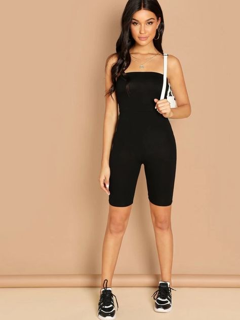 SHEIN Solid Form-Fitting Tube Romper A knit tube romper featuring a straight neckline and a form-fitting silhouette. This sleeveless romper is perfect for the warmer seasons. Create a sexy, athleisure look with a distressed denim jacket, sneakers, and sunglasses. Çolor: Black Fabric: High Stretch Fit Type: Skinny Length: Short Composition: 92% Rayon, 8% Spandex Neckline: Strapless Pattern Type: Plain Season: Summer #romper #rompers #dress    #dresses #fashion #style Tube Romper, Cami Romper, Strapless Romper, Cute Rompers, Sleeveless Rompers, Lace Romper, Printed Jumpsuit, Black Romper, Short Rompers