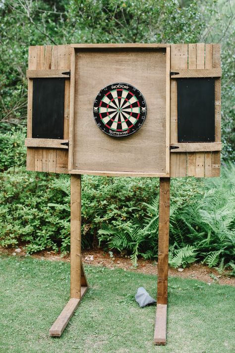 Dart Board Backboard Outdoor, Dart Board Wedding, Outdoor Dart Board Cabinet, Horseshoe Pits Backyard, Dart Board Outside, Large Backyard Lighting Ideas, Backyard Lawn Games, Cool Cornhole Designs, Wedding Dart Board