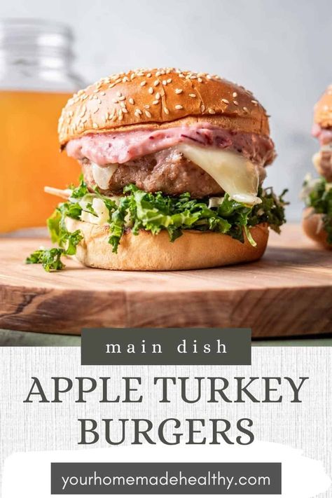 These Apple Turkey Burgers bring together all the flavors of fall on a soft, fluffy bun. Serve with cheddar cheese, kale apple slaw and a generous layer of cranberry aioli for the best juicy burgers. Apple Turkey Burgers, Cranberry Aioli, Fluffy Bun, Apple Turkey, Teriyaki Burgers, Cranberry Turkey, Burger Mix, Amazing Burger, Juicy Burgers