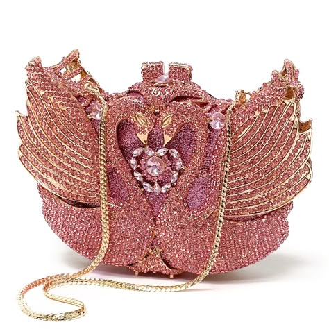 These Lovebirds evening handbag is a marvelous art, perfectly covered in brilliant pink crystals. This stunning bag is complete with gold color hardware and removable gold snap hook chain. This marvelous soulmate art bag can be carry in hand with or without chain. Glamorous and functional, this clutch can hold securely your keys, cards, cash and other small necessities.   Details: Measurement: 7.5in length x 5in high x 2in width Color: Pink crystals Lining: golden vegan leather Closure: magnetic Soulmate Art, Formal Evening Wear, Cute Purse, Girly Bags, Luxury Purses, Fancy Bags, Art Bag, Evening Handbag, Pretty Bags