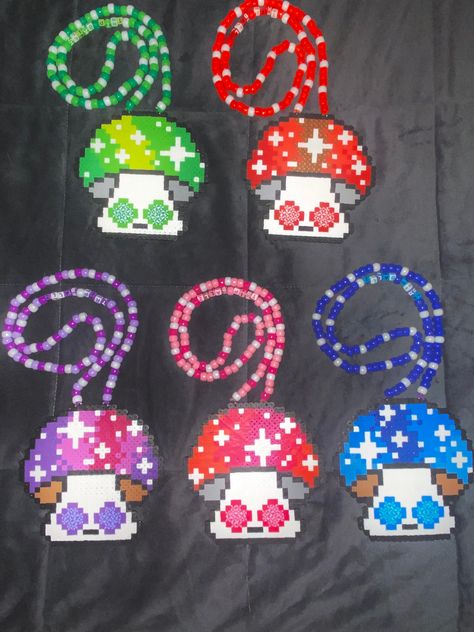 *Trippy Mushroom Perler Necklace *Choose your colour *Necklace or no necklace option available *Bead colours may vary slightly from pictures but will always be cute!!  *Every order comes with a hand written note Enjoy USA BUYERS: Please note that the small packet shipping option comes with NO TRACKING. Pearler Necklace Ideas, New Perler Bead Patterns, Rave Perler Necklaces, Perler Necklace Ideas, Perler Bead Crystal, Liquid Stranger Perler, Rave Fuse Beads, Perler Bead Necklace Ideas, Perler Ideas Rave