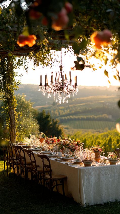 Capture the magic of a stunning outdoor Tuscany wedding! 🌾✨ Picture elegant ceramic dishware, lush blooms, and a glowing chandelier in a romantic setting. Let us help you preserve these moments. 📸💖 #TuscanyWedding #OutdoorDecor #RomanticDays #Midjourney Tuscany Wedding Decor, Ceramic Dishware, Barcelona Wedding, Romantic Vibes, Wedding Spain, Romantic Sunset, Glass Of Champagne, Wedding Decor Inspiration, Love Film