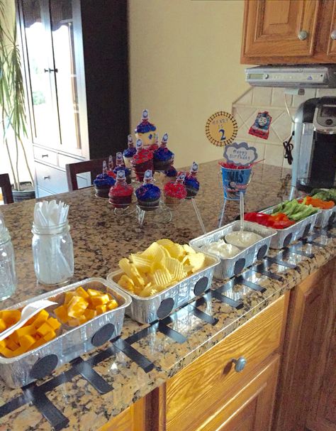 Train Birthday Party Table, Train Party Desserts, 4th Train Birthday Party, Thomas First Birthday Party, Train Birthday Party Food Ideas, Trucks And Trains Birthday Party, Train Birthday Party Outfit Mom, Train Theme Food Ideas, Train Birthday Food Ideas