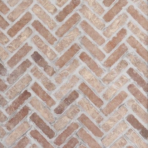 Herringbone tile floor entryway