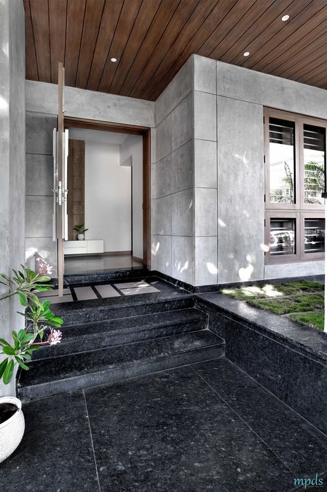 Large Fenestrations Bringing Out The Beauty Of This Residence | Manoj Patel Design Studio Residence Entry Design, Balcony Granite Flooring Ideas, House Entrance Design, Entrance Foyer Design, Wall Tiles Design, Main Gate Design, Entrance Foyer, H Design, Foyer Design