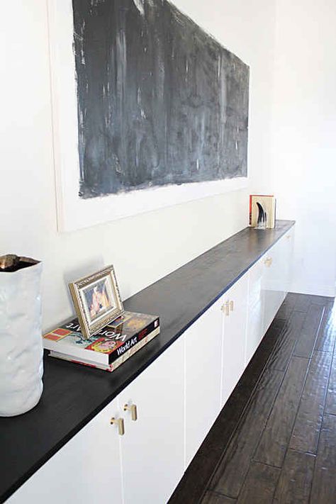 Floating kitchen cabinets are low-profile enough to be used as a hallway or dining room console. | 37 Cheap And Easy Ways To Make Your IKEA Stuff Look Expensive Ikea Floating Cabinet, Diy Credenza, Ideas Decoracion Salon, Diy Storage Projects, Dining Room Console, Ikea Kitchen Cabinets, Floating Cabinets, Diy Ikea Hacks, Diy Ikea