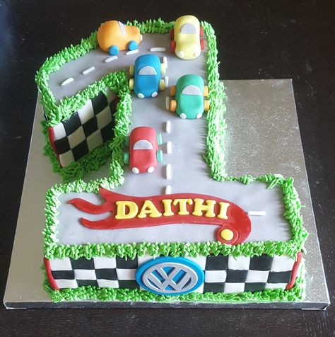 First birthday racing car cake with VW sign Racing Car Cake, Racing Birthday, Cars Birthday Cake, Easy Cake Decorating, Car Cake, Cars Birthday, Car Racing, Racing Car, Easy Cake