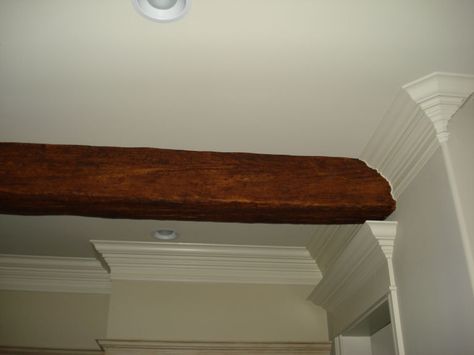 Scribing their beam gave it a seamless, natural look. Painted Wood Ceiling, Small Basement Remodeling, Houma Louisiana, Ceiling Crown Molding, Us Pictures, Wood Workshop, Faux Wood Beams, Faux Beams, Timber Beams