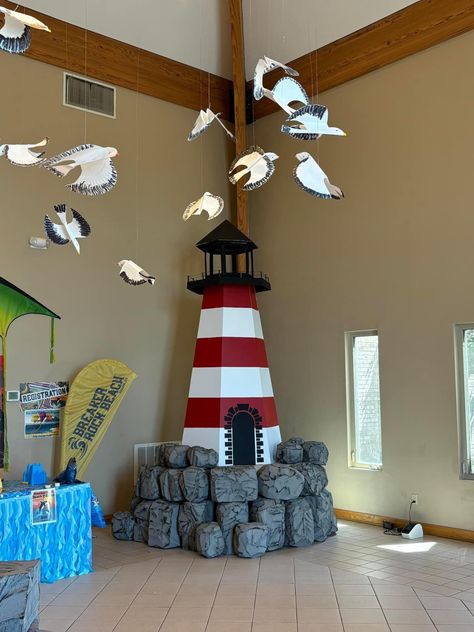 Lighthouse Decor Ideas, Diy Lighthouse Decor, Lighthouse Playground, Breaker Rock Beach Decorations, Breaker Rock Beach Vbs 2024 Decorations, Lighthouse Diy, Sea Decoration, Paper Flower Vase, Joy Decorations