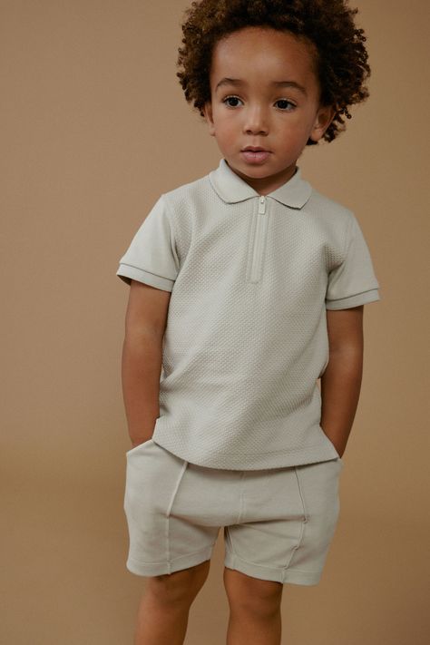 Made for off-duty days, our boys zip polo shirt and shorts set is a cute and comfortable addition to his wardrobe. Made from pure cotton, this co-ord features a short sleeve polo shirt with a quarter neck zip and drawcord shorts with pockets. Machine washable. Polo Shirt and Shorts 100% Cotton. Polo Event, Kids Wear Boys, Polo Fashion, Shirt And Shorts Set, Grey Quarter Zip, Zip Polo, Kids Ootd, Beachwear Skirt, Shirt And Shorts