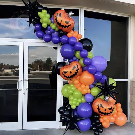 PRICES MAY VARY. 【 Halloween Balloon Arch Kit】- including 155pcs (purple ,green,orange and black) latex balloons,3pcs pumpkin foil balloons, 3pcs explosion star balloons , 5pcs dot glue (100 points), 1pc ribbon and 1pc balloon arch strip. 【MATERIALS】Halloween Balloon Garland are made from high-quality natural latex and foil film. Safety,durable,non-toxic and odorless. Our balloons can be maintained for more than 2-3 days after inflation. 【OCCASIONS】 -Halloween balloon arch kit is ideal halloween Halloween Balloon Decorations Ideas, Balloon Arch Halloween, Monster Balloon Arch, Halloween Balloon Arches, Trunk Or Treat Balloons, Halloween Cute Decorations, Halloween Balloon Backdrop, Halloween Balloon Columns, Halloween Balloon Arch