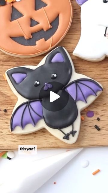 Maddie Gartmann on Instagram: "Share this cookie idea with your bestie for your upcoming baking/spooky movie night. (Not sure if that’s actually a thing but I think I now need to make that a thing, don’t you?)   I originally saw this design posted by @thebearfootbaker a few years back so please give her all the credit for the genius idea.   Decorating cookies, Halloween treats, bat cookies, cookie flips, Halloween cookies, reels for kids, Halloween diy, royal icing, sugar cookies, satisfying" Bat Cookies Royal Icing, Decorated Fall Cookies, Diy Royal Icing, Halloween Royal Icing Cookies, Cookie Flips, Halloween Cookies Royal Icing, Bat Cookies, Spooky Movie Night, Royal Icing Sugar Cookies