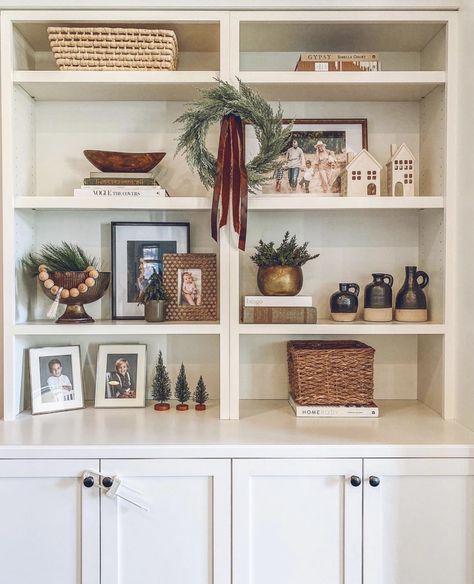 Minimal Built In Shelf Decor, Christmas Decor Ideas Built Ins, Bookshelf Holiday Decor, Christmas Decor On Built In Shelves, Decorating Built In Shelves For Christmas, White Bookshelf Decor Living Room, Christmas Bookshelf Styling, Modern Christmas Bookshelf Decor, Bookshelves Decorated For Christmas