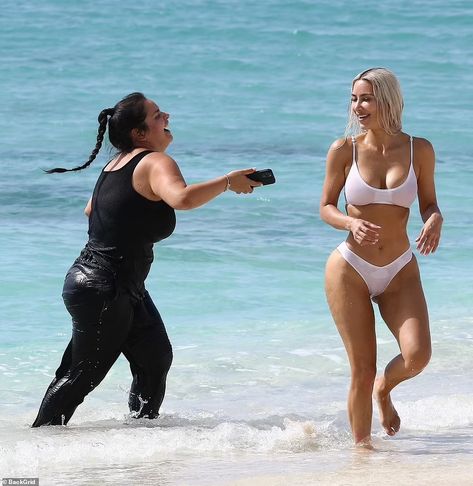 Kim Kardashian parades around in skimpy white bikini while frolicking on the beach | Daily Mail Online Kim Kardashian Hot, Womens Bathing Suits Bikinis, Toned Tummy, Kim Kardashian Style, White Bikinis, Last Friday, Swimsuits Hot, Kardashian Style, Body Inspiration