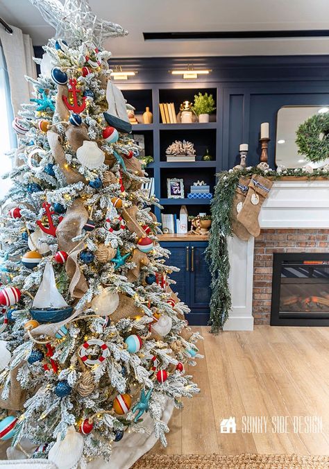 Flocked Nautical Christmas Tree Ideas | Flocked Trees with a Coastal Theme Lake Theme Christmas Tree, Fishing Tree Christmas, Nautical Christmas Tree Ideas, Ocean Christmas Tree, Lake House Christmas Tree, Enchanted Living Room, Surf Christmas Tree, Christmas Tree Ideas Flocked, Ocean Themed Christmas Tree