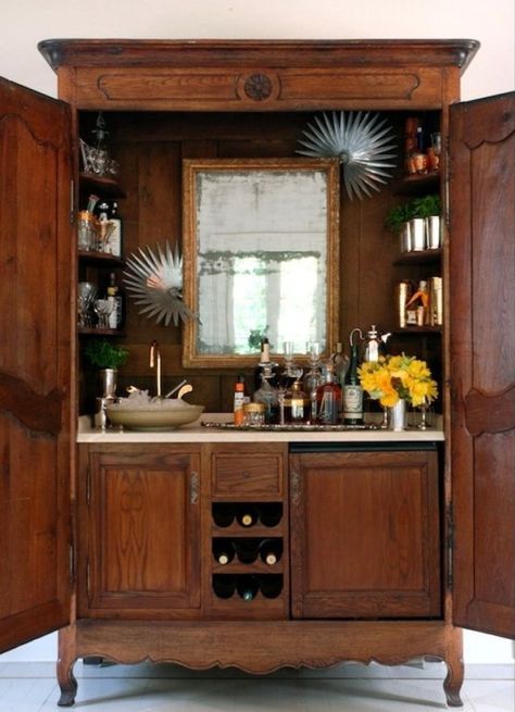 For all the old armoires out there: Bryan Batt retrofitted a vintage piece of furniture into a bar with a sink (he did it on Nate Berkus show) --SHELTER: January - Book Of The Month Armoire Bar, Bar Deco, Bandeja Bar, Vintage Armoire, Wet Bars, Bar Sink, Wet Bar, Redo Furniture, Repurposed Furniture