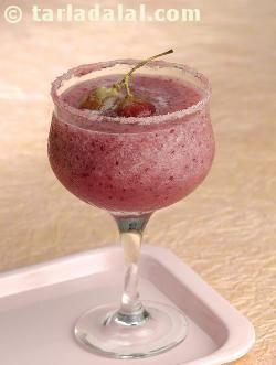 Grape margarita, the sweet yet tart flavour of grapes is enhanced when combined with strawberries. This mocktail is so named because of the margarita glass it is served in. Traditionally, all margaritas are served with a salt rim garnish. Grapes Recipes, Indian Raita, Party Sliders, Margarita Party, Watermelon Sorbet, Flavored Margaritas, Indian Drinks, Drinks Recipe, Healthy Afternoon Snacks