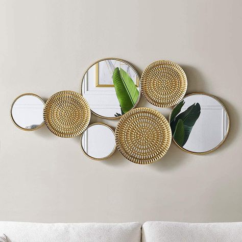 PRICES MAY VARY. Home Decor: An intricate frame gives this mirror modern sophistication and a touch of glam. With an antique gold finish, the Multiple metal circles can create a beautiful way to decorate your walls. Wall Art Style: Made from metal and mirror, with a textured gold plate, this large statement piece is simple yet striking. The Overlapping welded metal discs create modern irregular shape art that is perfect for any contemporary home setting while bringing light and space to the room Large Modern Wall Art, Home Decor Metal, Perfect Peace, Silver Walls, Living Room Mirrors, Wall Decor Set, Wall Sculpture Art, Gold Walls, Cubicle