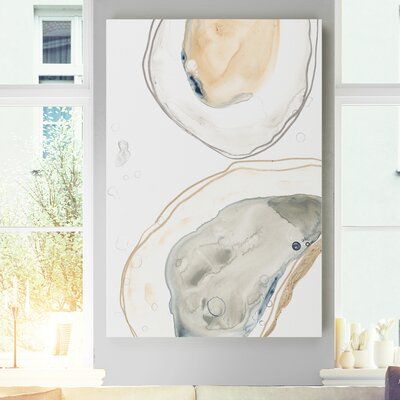 This painting print adds an easy coastal flair to your kitchen or dining room. It showcases a close-up of two watercolor oysters in gray, blue, and peach hues for an appetizing accent in your space. Inkblot details dot the canvas for a distinctive sketch-like look. This piece of wall art is giclee printed in the USA on your choice of materials in a variety of sizes, so you can find the one that works best for your space. Plus, it arrives with wall mounting hardware so you can decorate your home Oyster Art, Giclee Abstract, Boho Deco, Wall Mounting, Ocean Inspiration, Coastal Decor, Trademark Fine Art, Abstract Wall Art, Art Sur Toile