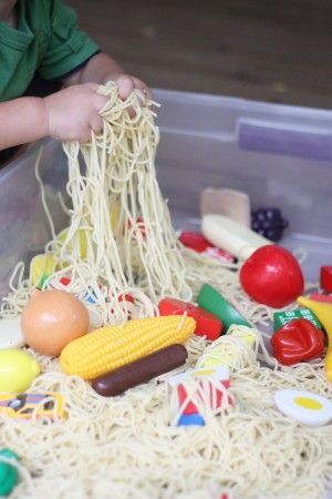 4 seasons theme: ready cloudy with a chance of meatballs...do spaghetti in sensory table and cloud picture for art Preschool Food, Sensory Tubs, Sensory Tub, Weather Theme, Sensory Boxes, Sensory Table, Kids Sensory, Sensory Bin, Toddler Fun