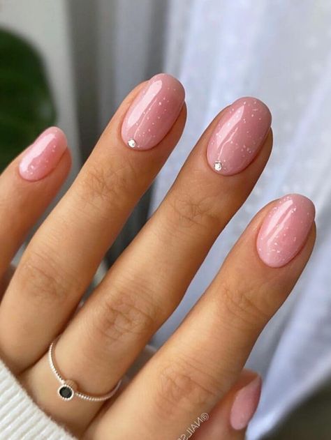 Short, shimmery, nude nails with a rhinestone accent Short Nails Ideas Pink Glitter, Ballerina Short Nails Designs Ideas, Simple Builder Gel Nails, Pink Gel Manicure Designs, Pink Gel Nails Short Design, Builder Gel Nail Ideas, Nail Designs Pink Glitter, Nails Inspiration Pink Glitter, Manicure Ideas Pink