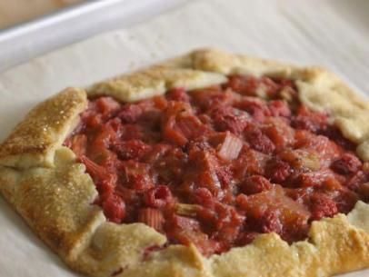 Raspberry Rhubarb Crostata Recipe | Ina Garten | Food Network Easy Rhubarb Recipes, Rhubarb Galette, Crostata Recipe, Raspberry Rhubarb, Galette Recipe, Ina Garten Recipes, Rhubarb Recipes, Strawberry Rhubarb, Crust Recipe