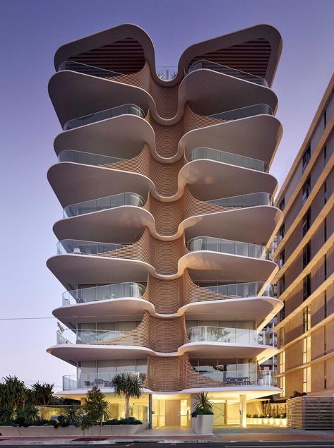 This sculptural and eye-catching building has organic, overlapping architectural curves that resemble the nearby heritage-listed Norfolk Pine Trees. Koichi Takada, Color Exploration, Thesis Ideas, Urban Housing, Norfolk Pine, Passive Solar Design, Timber Roof, Residential Building Design, Burleigh Heads