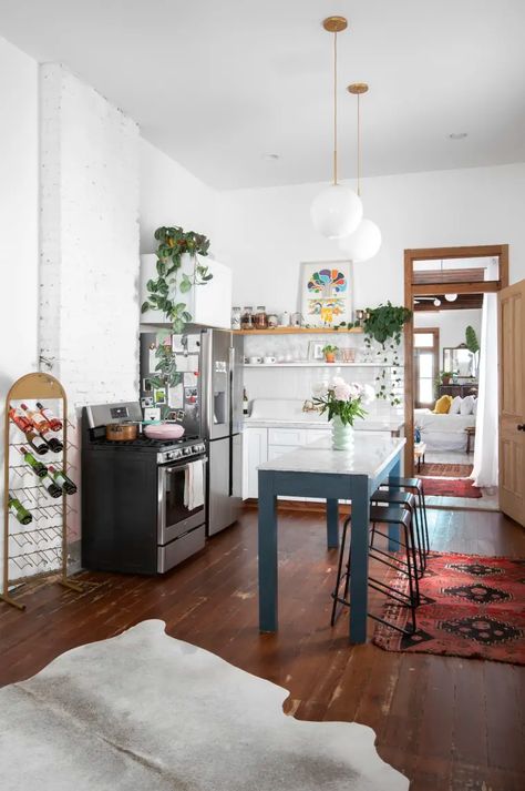 Renovating Inspiration New Orleans Architecture - Before and After | Kitchn New Orleans Architecture, Wassily Chair, Urban Outfitters Home, Shotgun House, Fireplace Facade, Dining Room Remodel, Wood Floors Wide Plank, New Orleans Homes, Gorgeous Houses