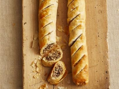 Sausage & Mushroom Strudels Recipe | Ina Garten | Food Network Mushroom Strudel, Bread Crumb Chicken, Sausage Mushroom, Strudel Recipes, Fresh Bread Crumbs, Ina Garten Recipes, Sweet Italian Sausage, Phyllo Dough, Food Network Magazine