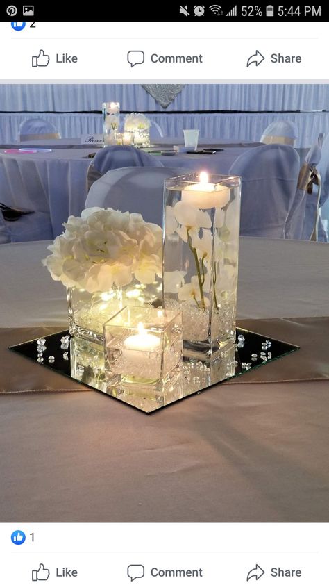 Fairy Light Vase Centerpiece Wedding, Glam Wedding Theme Ideas, Mirror Wedding Centerpieces Floating Candles, Centerpieces Wedding Lights, Clear Glass Decoration Ideas, Small Wedding Table Decor, Gold And Silver Wedding Decor, Elegant Centerpieces Wedding, Wedding Decorations Diy Centerpiece