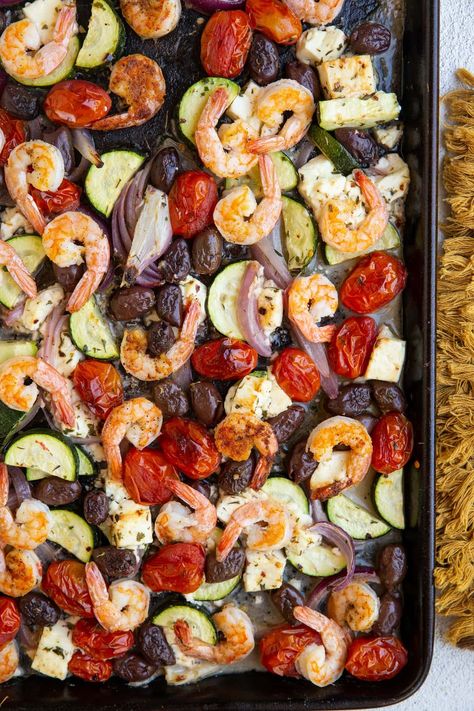 Mediterranean Sheet Pan Shrimp and vegetables is a delicious complete meal ready in a jiffy! A delicious, healthy weeknight dinner the whole family will love. Mediterranean Sheet Pan, Garlic Rosemary Chicken, Sheet Pan Shrimp, Pan Shrimp, Zucchini Feta, Shrimp And Vegetables, Sheet Pan Suppers, Breakfast Cookies Healthy, Sheet Pan Dinners Recipes