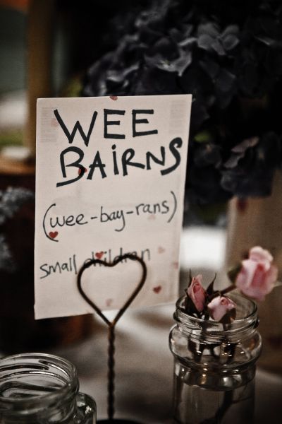 Table names - Scottish words and phrases. Great for a laugh.  This was my youngest daughter's nick name for many years. Scottish Birthday Party, Scottish Party, Scottish Wedding Themes, Scottish Wedding Traditions, Wedding Redo, Tartan Wedding, Wedding Table Decoration, Burns Night, Wedding Table Names