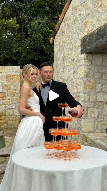 Cupid Content Co. | Wedding Content Creators on Instagram: "You’ve seen champagne towers, but have you seen an aperol spritz tower? We’re obsessed with this for a summer wedding! 🧡🍸  Styled shoot vendor team:  Planning and design @sipsipmobilebar  Venue @maisondesoliviersevents  Drinks @sipsipmobilebar  Model @paulinabreanne  Content creator @cupidcontentco  Hair @bridalbyangmillion  Makeup @donnadoesbeauty  Dress @dalliancegownrentals  Accessories @jaykaybraidsandbridal   #weddingideas #weddingcontentcreator #weddingcontentcreation" Aperol Spritz Tower, Champagne Towers, Jazz Wedding, Wedding Content, Amalfi Coast Wedding, Champagne Tower, Garden Party Wedding, Orange Wedding, Wedding Vibes