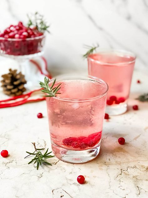 Mistletoe Kiss Cocktail Mistletoe Kiss Cocktail, Kiss Cocktail, Kiss Shot, Mistletoe Kiss, Rosemary Sprigs, Rum Drinks, Jolly Holiday, Fresh Cranberries, Christmas Cocktails