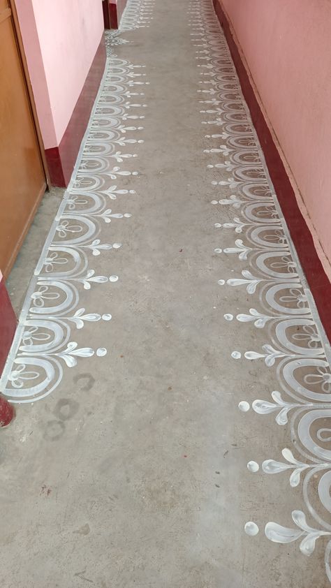 White Rangoli Border, Alpona Border Design, Rangoli Painting On Floor, Alpana Designs Bengali Border, Tulsi Puja, Bengali Alpona, Kolka Art, Jhoti Design, Alpona Art