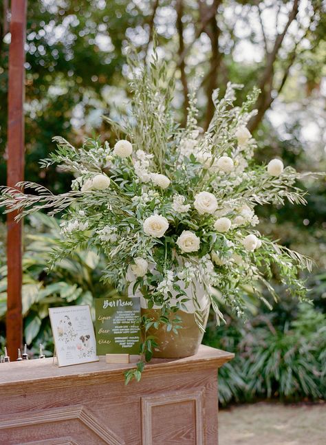 Wedding Bar Arrangement, White Mums Wedding, Bar Flower Arrangement, Bar Floral Arrangement, Bar Flowers, Olive Branch Wedding, Bar Wedding Reception, Wedding Cheers, Mums Wedding